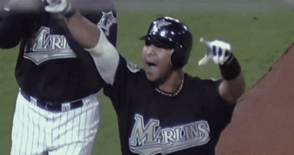 alex gonzalez world series walk-off celebration.gif